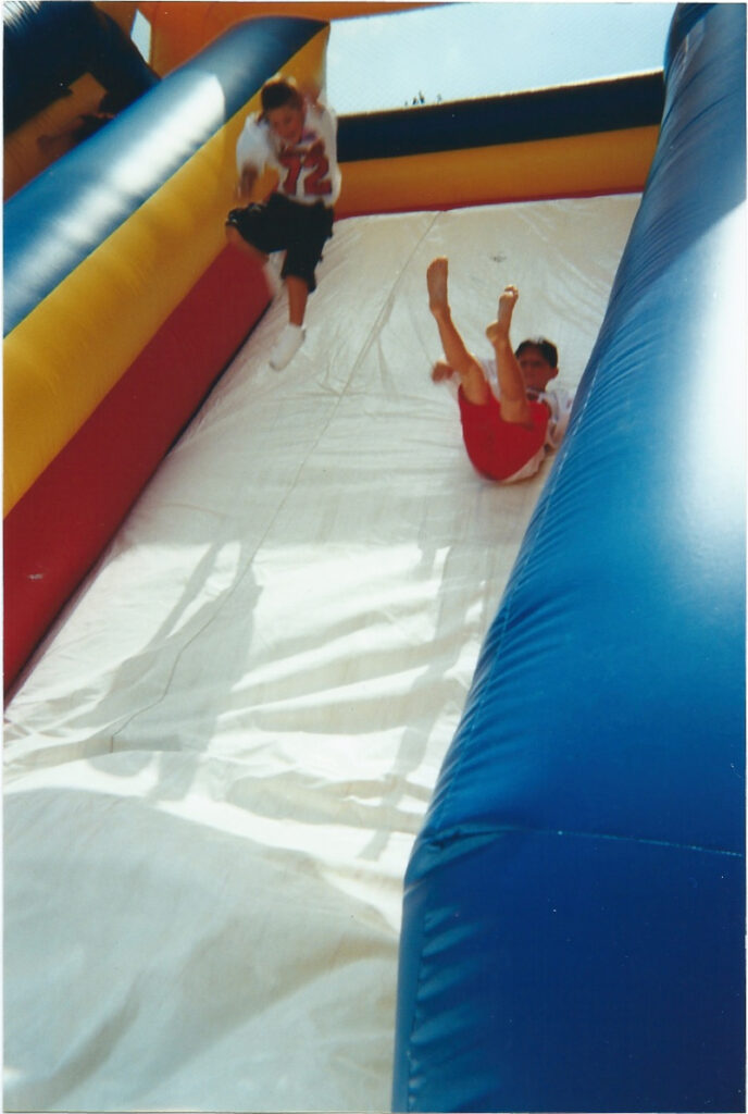 Taylor going down a slide