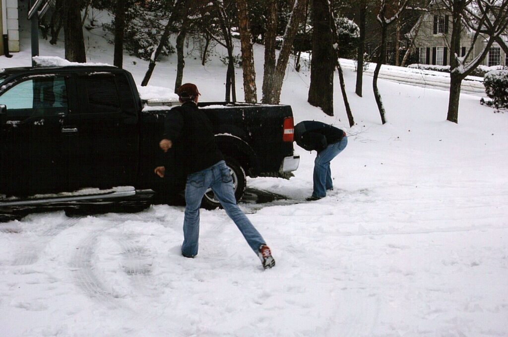 Taylor and Tim having a snowball fight